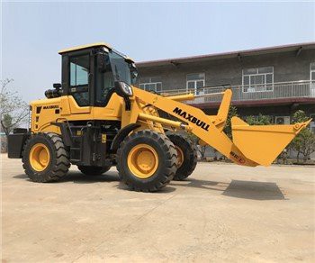 Carregador de tractor compacte